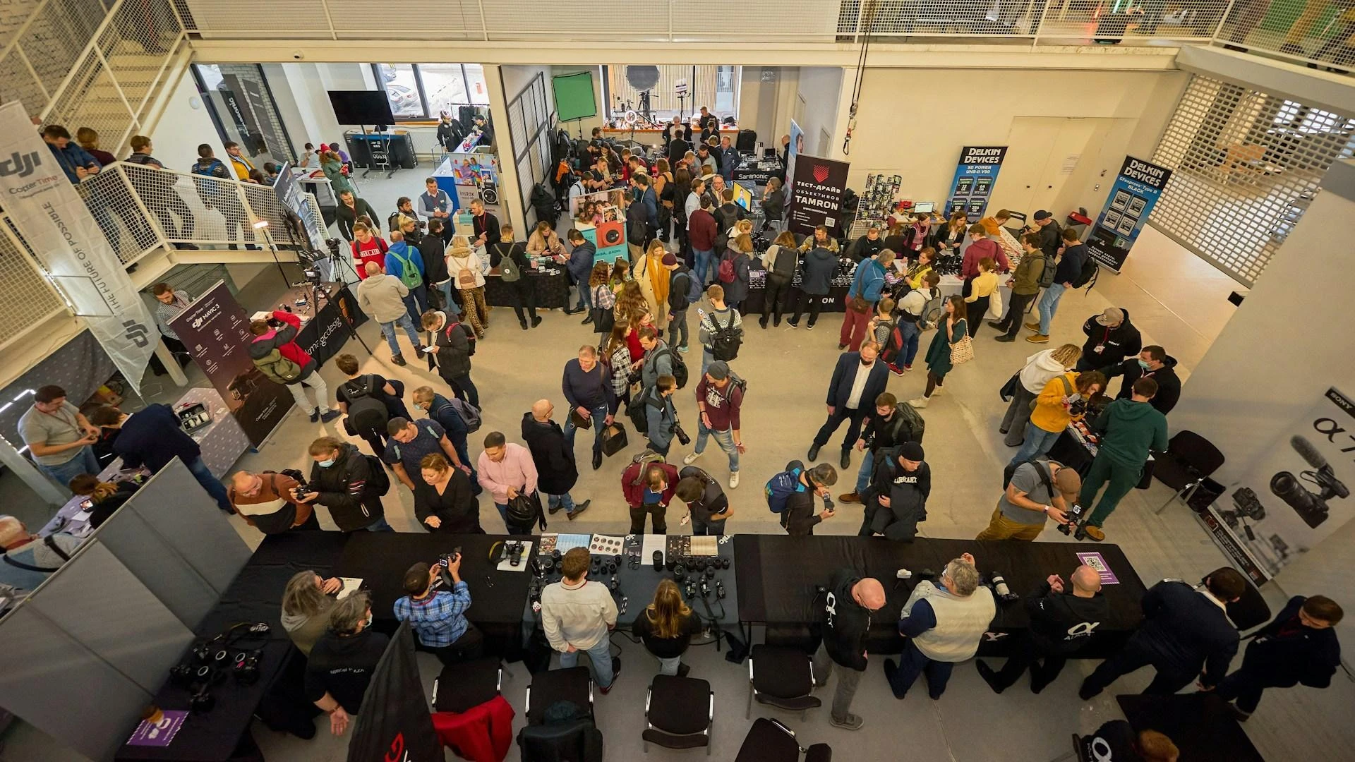 The foyer of the trade show where attendees pick up entry information and browse tradeshow giveaways