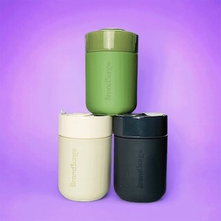 Debossing on a dark leather notebook showing a logo pressed deep into the cover with a tactile high-end finish