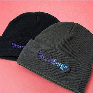 Embroidery on a navy polo shirt showing a raised multi-thread logo with premium stitched texture