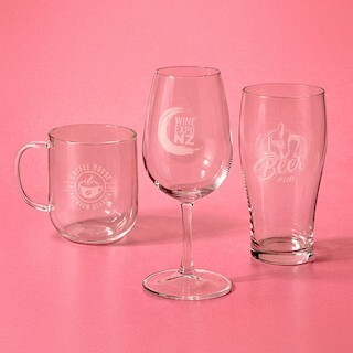 Imitation etch on a glass tumbler showing a frosted etched-glass effect logo via pad print