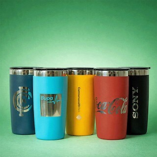 Laser engraving on a stainless steel drink bottle showing a permanently etched logo with clean precise lines