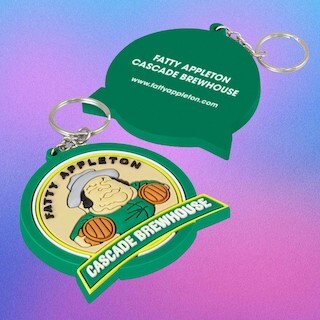 Soft moulded PVC logo badge with raised colour layers