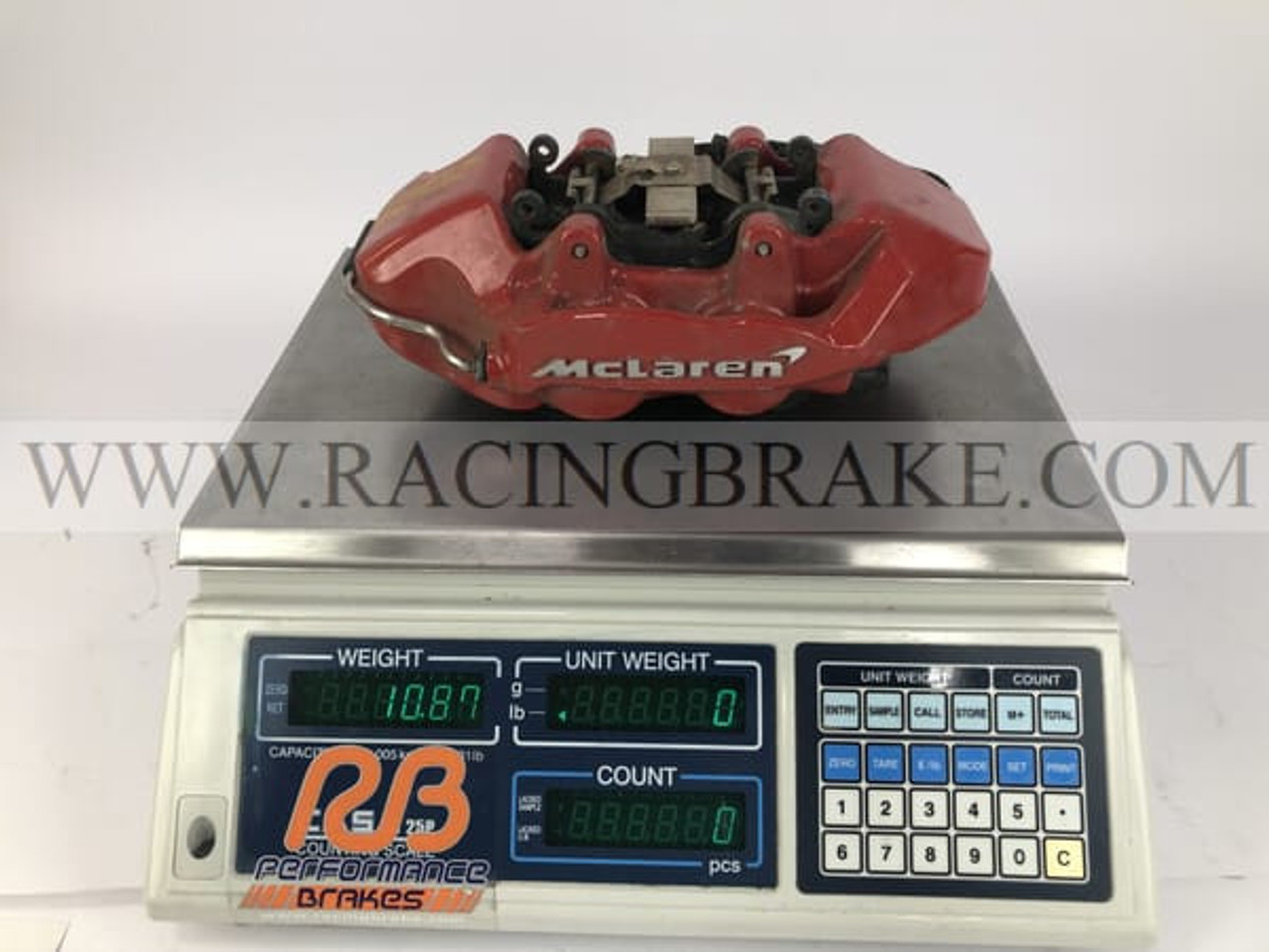 Rear OE caliper