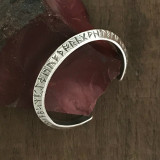 Sterling Silver Cuff Bracelet with ancient Runes handmade by Bowman Originals, Sarasota, 941-302-9594. 