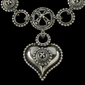 The playful design of this  Handmade Sterling Silver Heart Necklace is a beautiful expression of love and style. Made in the USA. 100% Guarantee.Call or text 941-302-9594. www.BowmanOriginals.com The playful design of this  Handmade Sterling Silver Heart Necklace is a beautiful expression of love and style. Made in the USA. 100% Guarantee.Call or text 941-302-9594. www.BowmanOriginals.com