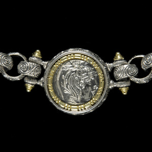 This Sterling Silver and 18k Gold Athena Necklace is a sophisticated and symbolic design that combines strength and grace, making this necklace not only a beautiful accessory but a powerful symbol of intellect, protection, and empowerment. Handmade in the USA. 100% Guarantee. This Sterling Silver and 18k Gold Athena Necklace is a sophisticated and symbolic design that combines strength and grace, making this necklace not only a beautiful accessory but a powerful symbol of intellect, protection, and empowerment. Handmade in the USA. 100% Guarantee.