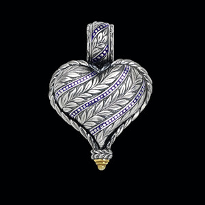 This beautiful Sterling Silver and Blue Enamel Heart Pendant features charming engraving with Old World Enamel, blending rich, intricate detailing with a classic design that seamlessly blends vintage allure with contemporary sophistication. Handmade in the USA. 100% Guarantee.Call or text 941-302-9594. www.BowmanOriginals.com This beautiful Sterling Silver and Blue Enamel Heart Pendant features charming engraving with Old World Enamel, blending rich, intricate detailing with a classic design that seamlessly blends vintage allure with contemporary sophistication. Handmade in the USA. 100% Guarantee.Call or text 941-302-9594. www.BowmanOriginals.com