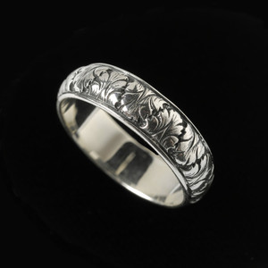 The continuous design of this Sterling Silver Acanthus Ring Band evokes a sense of timelessness and infinite love making it a perfect choice for a piece that signifies the enduring bond between two people. Handmade in the USA. 100% Guarantee. Call or text 941-302-9594. www.BowmanOriginals.com The continuous design of this Sterling Silver Acanthus Ring Band evokes a sense of timelessness and infinite love making it a perfect choice for a piece that signifies the enduring bond between two people. Handmade in the USA. 100% Guarantee. Call or text 941-302-9594. www.BowmanOriginals.com