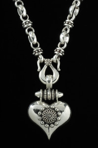 Whether worn every day or for special moments, this handmade Sterling Silver Heart Necklace is a quiet expression of affection, its beauty growing richer with time. Made in the USA. Call or text 941-302-9594. www.BowmanOriginals.com  Whether worn every day or for special moments, this handmade Sterling Silver Heart Necklace is a quiet expression of affection, its beauty growing richer with time. Made in the USA. Call or text 941-302-9594. www.BowmanOriginals.com