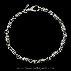 Barrel Chain Link Stacking Bracelet handmade in sterling silver by Bowman Originals, Sarasota, Florida.
 Barrel Chain Link Stacking Bracelet handmade in sterling silver by Bowman Originals, Sarasota, Florida.