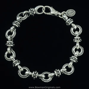 Sundial Chain Link Bracelet handmade in sterling silver with 10mm wide links by  Bowman Originals, Sarasota, FL.