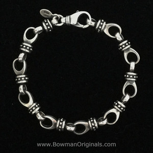 Tab Chain Link Stackable Bracelet handmade in sterling silver by Ned Bowman, Bowman Originals, Sarasota, Florida.
 Tab Chain Link Stackable Bracelet handmade in sterling silver by Ned Bowman, Bowman Originals, Sarasota, Florida.