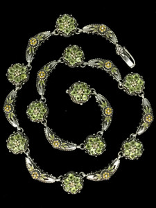This Sterling Silver, 18k Gold, and Peridot Wildflower Cluster Necklace feels both fresh and timeless, perfect for those who appreciate craftsmanship and the inherent beauty found in the natural world. Handmade in the USA. Call or text 941-302-9594. www.BowmanOriginals.com This Sterling Silver, 18k Gold, and Peridot Wildflower Cluster Necklace feels both fresh and timeless, perfect for those who appreciate craftsmanship and the inherent beauty found in the natural world. Handmade in the USA. Call or text 941-302-9594. www.BowmanOriginals.com