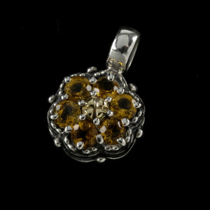 This handmade Sterling Silver and 18k Gold Citrine Cluster pendant's vibrant color makes it an exquisite piece that can elevate any outfit. Made in USA. Call or text 941-302-9594. www.BowmanOriginals.com This handmade Sterling Silver and 18k Gold Citrine Cluster pendant's vibrant color makes it an exquisite piece that can elevate any outfit. Made in USA. Call or text 941-302-9594. www.BowmanOriginals.com