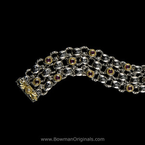 Handmade Sterling Silver & 18k Gold Laurel Leaf Bracelet with rhodolite garnet, diamond, and black vitreous enamel
Handmade Sterling Silver & 18k Gold Laurel Leaf Bracelet with rhodolite garnet, diamond, and black vitreous enamel