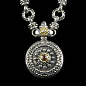 Embrace the carefree spirit with this enchanting handmade Sterling Silver Sundial Necklace with 18k gold accents, garnet and diamond gemstones. Made in the USA. 100% Guarantee. www.BowmanOriginals.com. 941-302-9594. Embrace the carefree spirit with this enchanting handmade Sterling Silver Sundial Necklace with 18k gold accents, garnet and diamond gemstones. Made in the USA. 100% Guarantee. www.BowmanOriginals.com. 941-302-9594.