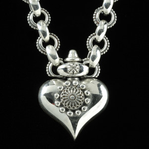 Sterling Silver handmade Heart Necklace with link chain by Bowman Originals, Sarasota, 941-302-9594. Sterling Silver handmade Heart Necklace with link chain by Bowman Originals, Sarasota, 941-302-9594.