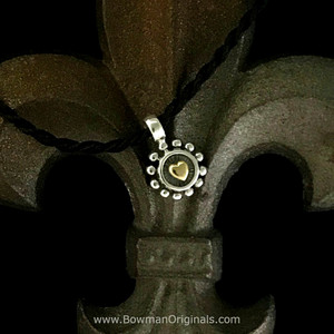 Beaded Sterling Silver and 18 K Gold Heart Pendant on black silk cored handmade by Bowman Originals, Sarasota, 941-302-9594 Beaded Sterling Silver and 18 K Gold Heart Pendant on black silk cored handmade by Bowman Originals, Sarasota, 941-302-9594