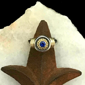 The interplay of metals and the vibrant sapphire make this handmade Sterling Silver and 18k Gold Sapphire Ring a true statement piece, perfect for any occasion, whether as an engagement ring, a special gift, or a cherished personal treasure. Made in the USA. Call or Text 941-302-9594. www.BowmanOriginals.com The interplay of metals and the vibrant sapphire make this handmade Sterling Silver and 18k Gold Sapphire Ring a true statement piece, perfect for any occasion, whether as an engagement ring, a special gift, or a cherished personal treasure. Made in the USA. Call or Text 941-302-9594. www.BowmanOriginals.com