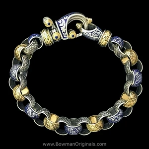 Handmade Laurel Leaf Bracelet in Sterling Silver, 18k Gold, Blue Enamel and Blue Sapphires by Bowman Originals, front view
