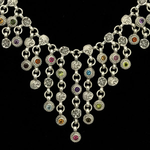 This Handmade Sterling Silver and Multicolor Gemstone Bib necklace is an enchanting accessory that will elevate any evening ensemble or special occasion attire with its dazzling array of colors and intricate design. Made in the USA.100% Guarantee. Call or Text 941-302-9594. www.BowmanOriginals.com
