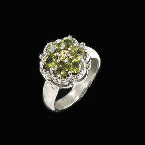 This handmade Sterling Silver and 18k Gold Peridot Cluster ring exudes both elegance and playfulness, making it a perfect choice for those who appreciate unique, vibrant jewelry. Made in the USA. 100% Guarantee. Call or text 941-302-9594 www.BowmanOriginals.com This handmade Sterling Silver and 18k Gold Peridot Cluster ring exudes both elegance and playfulness, making it a perfect choice for those who appreciate unique, vibrant jewelry. Made in the USA. 100% Guarantee. Call or text 941-302-9594 www.BowmanOriginals.com
