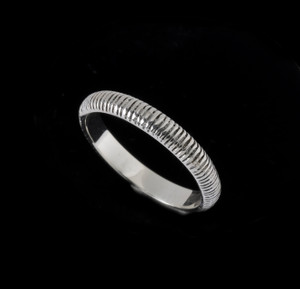 This handmade Sterling Silver Ribbed ring's raised lines create a sparkle as the light glints off of the surface and gives the ring a sophisticated and tactile feel. Made in the USA. 100% guarantee. Call or text 941-302-9594. www.BowmanOriginals.com This handmade Sterling Silver Ribbed ring's raised lines create a sparkle as the light glints off of the surface and gives the ring a sophisticated and tactile feel. Made in the USA. 100% guarantee. Call or text 941-302-9594. www.BowmanOriginals.com