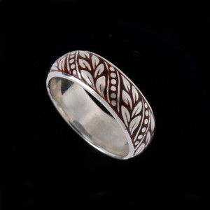 This Laurel Leaf Ring Band features intricate, stylized laurel leaves symbolizing victory, honor, and achievement. Handcrafted of Sterling Silver and Brown Enamel in the USA. 100% guarantee. Call or text 941-302-9594. www.BowmanOriginals.com This Laurel Leaf Ring Band features intricate, stylized laurel leaves symbolizing victory, honor, and achievement. Handcrafted of Sterling Silver and Brown Enamel in the USA. 100% guarantee. Call or text 941-302-9594. www.BowmanOriginals.com