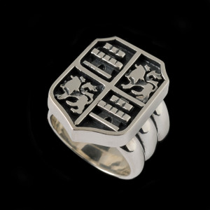 Shield Ring. Sterling Silver. Castillion and Leones, Castle and Lion Shield. Handmade in the Bowman Originals Workshop, Sarasota, Fl. Call or text 941-302-9594. Visit www.bowmanoriginals.com. Shield Ring. Sterling Silver. Castillion and Leones, Castle and Lion Shield. Handmade in the Bowman Originals Workshop, Sarasota, Fl. Call or text 941-302-9594. Visit www.bowmanoriginals.com.