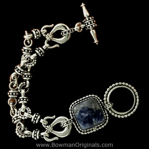 Hand-cut Sodalite cabochon set in handmade Sterling Silver two row toggle bracelet by bowman Originals, Sarasota, Fl. Hand-cut Sodalite cabochon set in handmade Sterling Silver two row toggle bracelet by bowman Originals, Sarasota, Fl.
