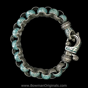 Santa Fe–inspired Sterling Silver Laurel Leaf Hook Bracelet with Turquoise Enamel and leaf links by Bowman Originals
Santa Fe–inspired Sterling Silver Laurel Leaf Hook Bracelet with Turquoise Enamel and leaf links by Bowman Originals