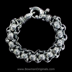Handmade Sterling Silver Rolled Laurel Leaf Link Hook Bracelet handmade by Bowman Originals, USA
Handmade Sterling Silver Rolled Laurel Leaf Link Hook Bracelet handmade by Bowman Originals, USA