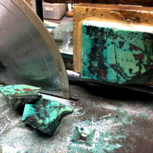 Saving "face" ... cutting a Chrysocolla stone