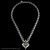 Handcrafted sterling silver chain necklace with garnet heart pendant set in 18k gold bezel by Bowman Originals, full view
