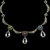 This Sterling Silver and 18k Gold Three Drop Crescent Necklace with White Topaz Drops is beautifully complemented by a harmonious blend of colorful gemstones each adding a unique and vibrant hue to the design. Handmade in the USA. 100% Guarantee. Call or text 941-302-9594. www.BowmanOriginals.com