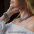 Woman wearing a handmade Three Row Sterling Silver Laurel Leaf Link Bracelet crafted by Bowman Originals.
