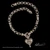 Reverse side: Handmade Laurel Leaf reversible heart necklace in Sterling Silver and 18k Yellow Gold by Bowman Originals- reverse view.
