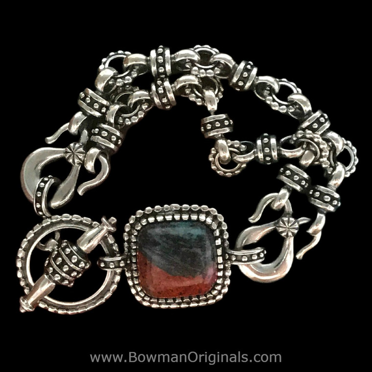 Handmade Sterling Silver Toggle Bracelet with hand-cut Sonora Chrysocolla Cabochon by Bowman Originals, Sarasota FL.
