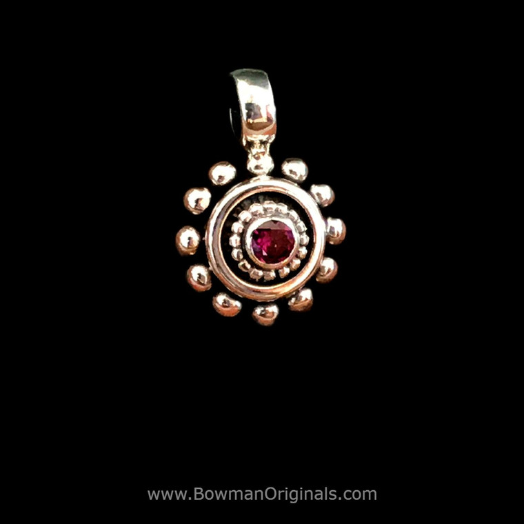 Beaded Rhodolite Garnet Sterling Silver Pendant by Bowman Originals, Sarasota, 941-302-9594. Beaded Rhodolite Garnet Sterling Silver Pendant by Bowman Originals, Sarasota, 941-302-9594.