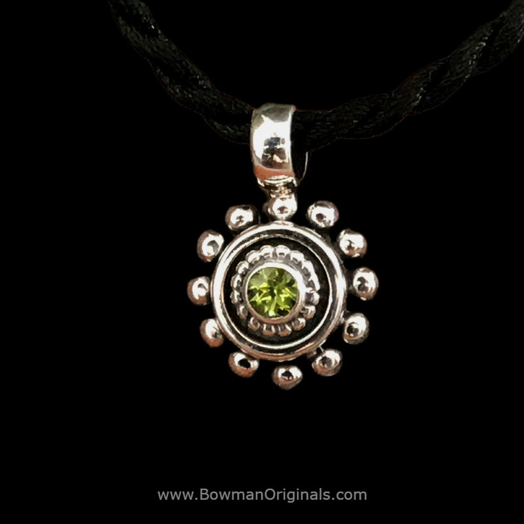 Beaded Sterling Silver and Peridot Pendant on Black Silk Cord handmade  by Bowman Originals, Sarasota, 941-302-9594 Beaded Sterling Silver and Peridot Pendant on Black Silk Cord handmade  by Bowman Originals, Sarasota, 941-302-9594