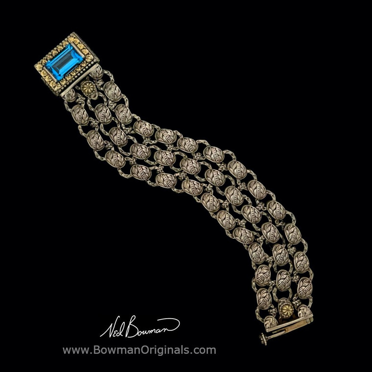 Legacy Blue Topaz bracelet handcrafted in sterling silver and 18k gold by Bowman Originals, full view
