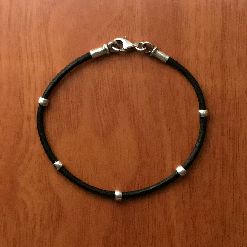 Silver and Leather black cord bracelet, 2 mm, lobster clasp | Bowman Originals, Sarasota, 941-302-9594.