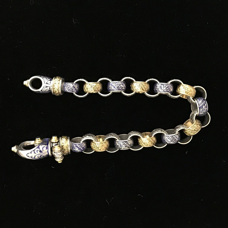 Handmade "Hook" Bracelet in Silver, Gold, Enamel and Blue Sapphires by Bowman Originals, Sarasota, 941-302-9594.