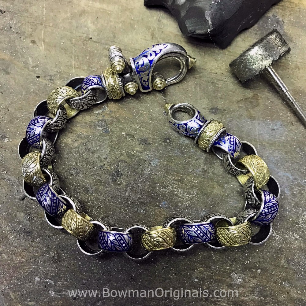 handmade-silver-gold-blue-enamel-bracelet-2205sggsxc-on-workbench-at-bowman-originals.jpg