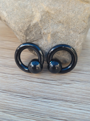 How to Style Stretched Lobes with Hanging Earrings, CBRs & Spirals
