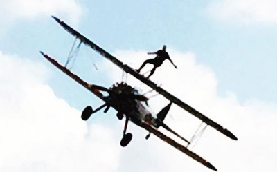 Tesla/SpaceX CEO Elon Musk Walked Across A Flying Biplane