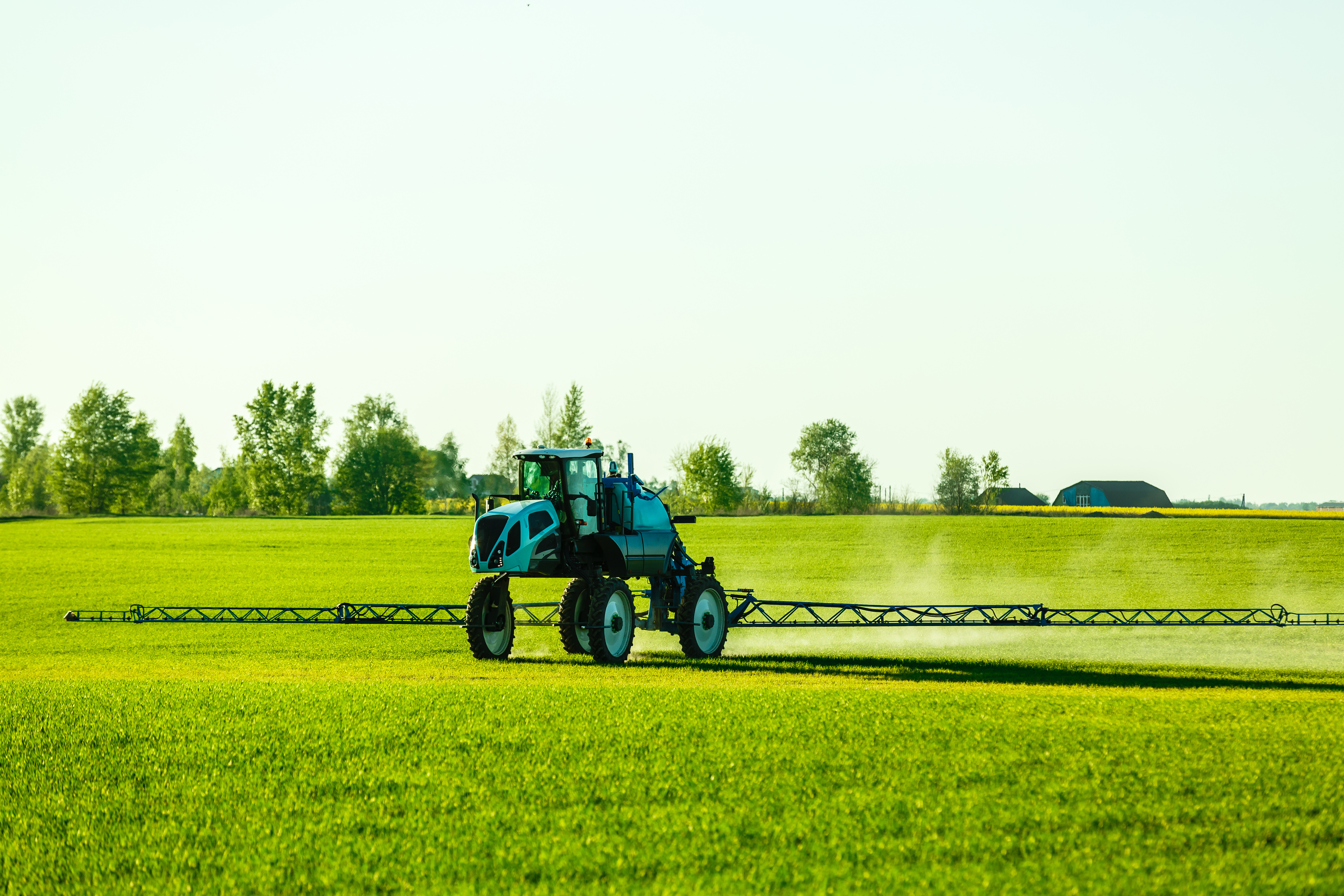 Blue Tractor working in a field