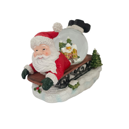 Santa and Sleigh snowglobe with Music 22cm