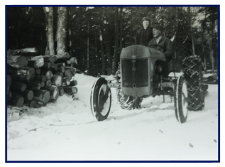 Don and his father on a tractor. Don and his father on a tractor.