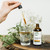 St. Francis Sinafect Sinus Support Tincture - picture of a dropper adding the tincture to a glass of water St. Francis Sinafect Sinus Support Tincture - picture of a dropper adding the tincture to a glass of water